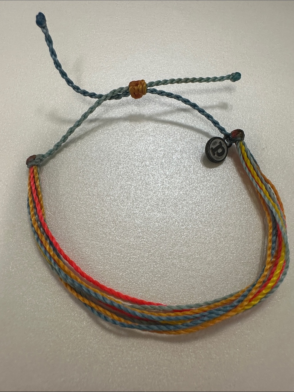 NWOT Pura Vida Multicolor Braided String Bracelet with Logo Charm